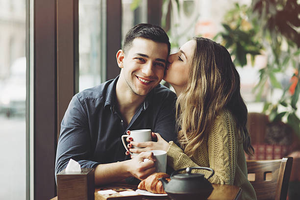 istock Couple in love drinking coffee in coffee shop 504536706