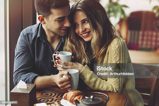 Couple In Love Drinking Coffee In Coffee Shop Stock Photo - Download Image Now - Coffee - Drink, Valentine's Day - Holiday, Couple - Relationship