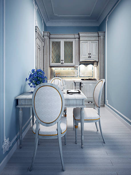 istock Blue tiny kitchen with classic white furniture 504537424