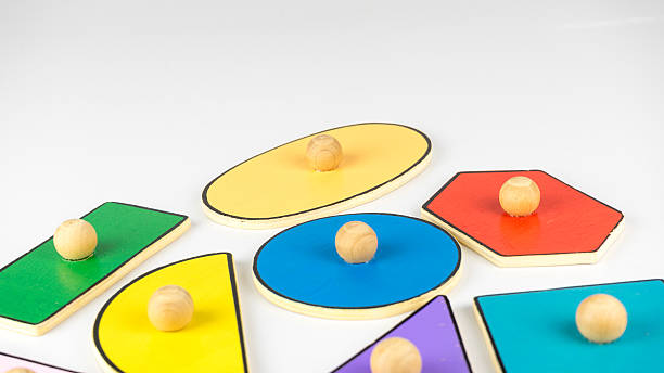 istock Various types of wooden shape and colour on empty surface 504537504