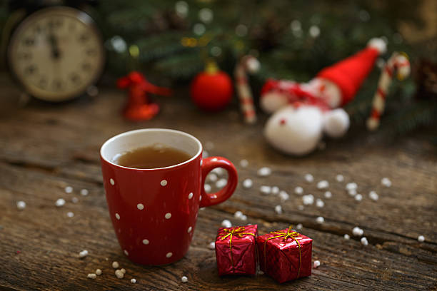 istock Tea cup with christmas decoration on wooden table 504537560