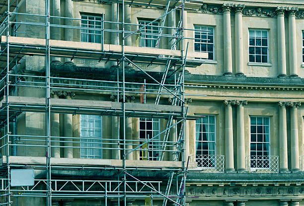 istock Home repair on The Circus building in Bath England 504537612