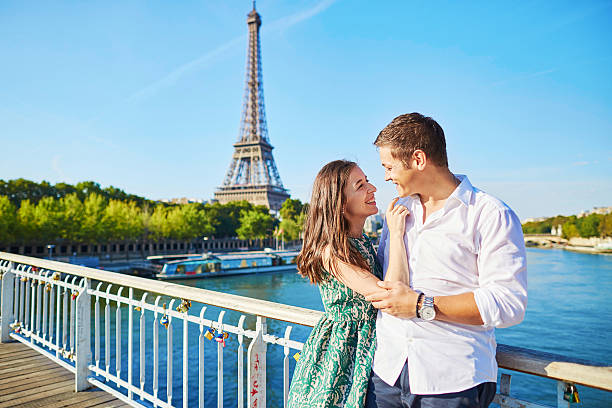 istock Young romantic couple having a date near the Eiffel tower 504538534