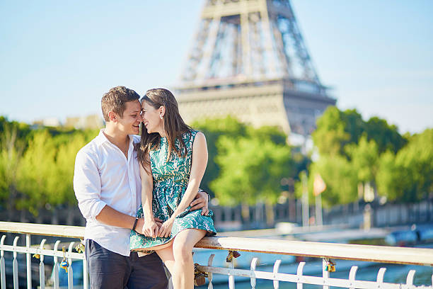 istock Young romantic couple having a date near the Eiffel tower 504538748