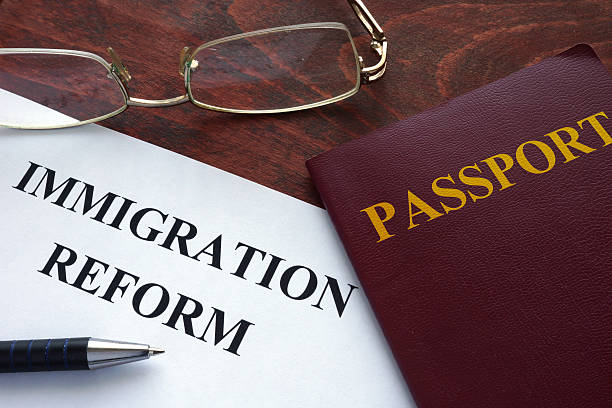 istock Paper with immigration reform on a table. 504538926