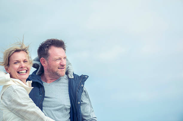 istock Mature couple looking at view. 504538936