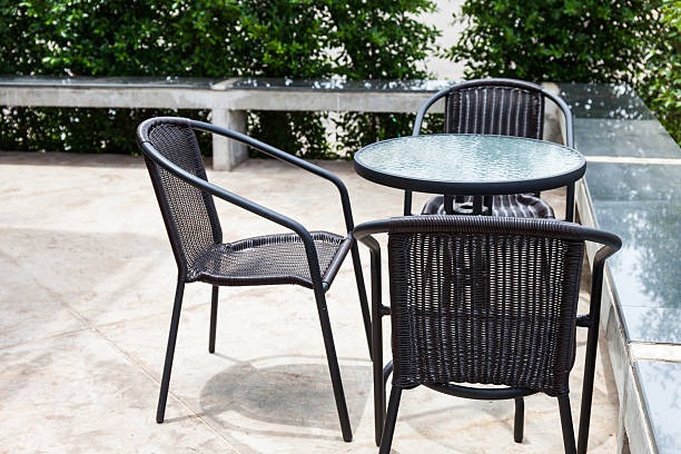 istock Striped table and wicker armchair 504539081