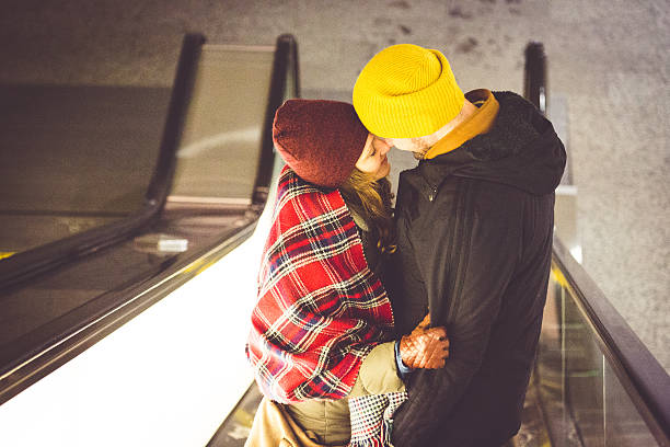 istock Love at moving staircase 504539144