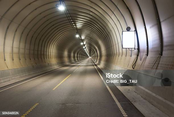 Long Road Tunnel Stock Photo - Download Image Now - Tunnel, The Way Forward, Highway