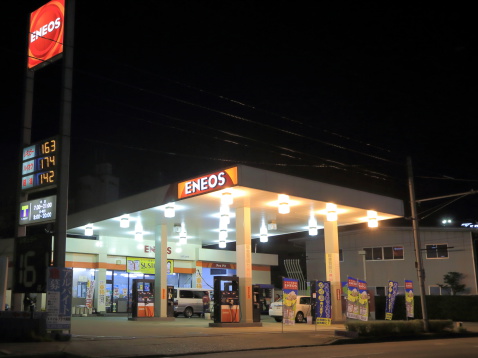 Kanazawa Japan - 16 June, 2014:People buy petrol at ENEOS petrol station in Kanazawa Japan.