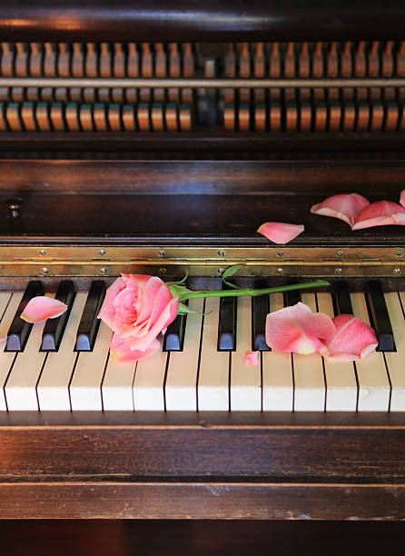 Piano chord A major shown by hearts on the keys