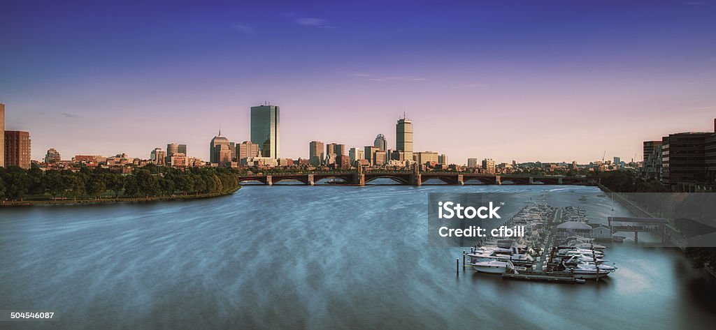 Boston Skyline at Dusk A great view of Boston from across the waterfront from science park Boston - Massachusetts Stock Photo