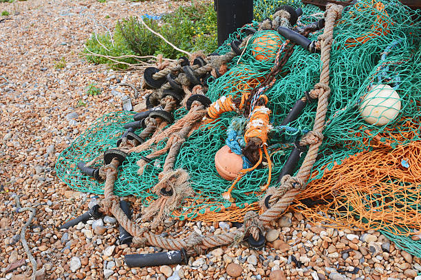 istock Green and orange fishing nets 504546827