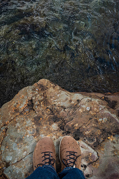 istock Standing On The Edge Of A Cliff 504561783