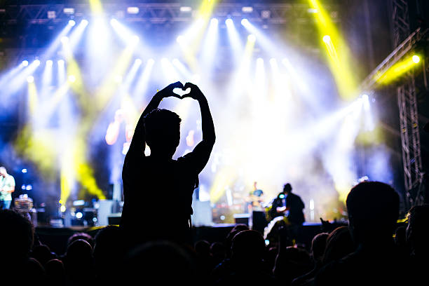 istock Heart shape with hands at the concert 504563193
