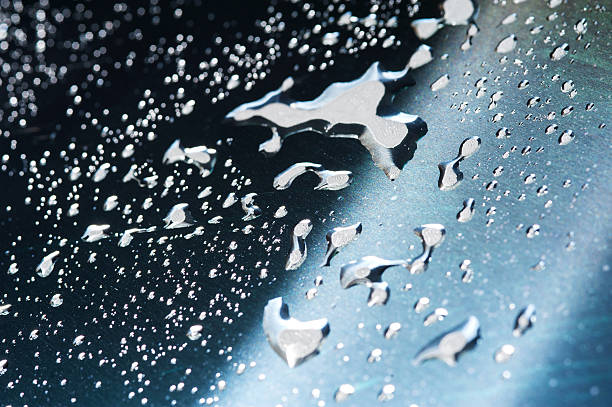 istock Drops of water on glass 504564653
