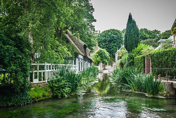 istock River, House, Thatched roof, Normandy 504565261