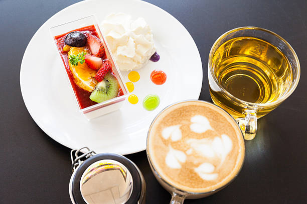 istock strawberry cream and a cup of tea and cofee 504565583