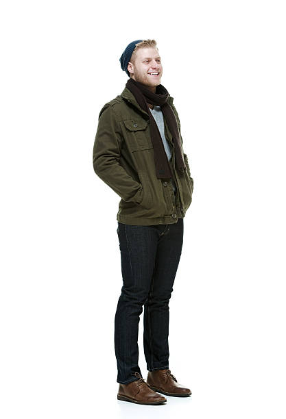 istock Smiling man in winter clothes & looking away 504566777