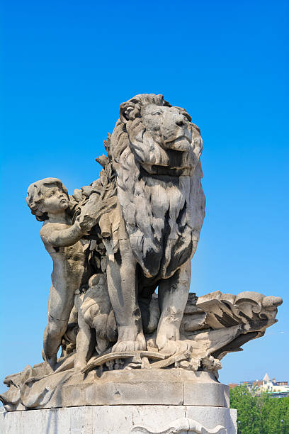 istock Child with lion statue , Alexander's III bridge 504566879