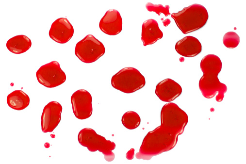 Glossy red liquid droplets (splatters) isolated on white. Clipping path available.
