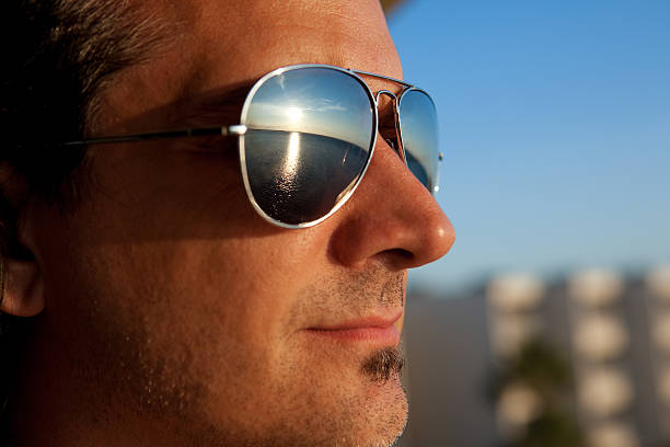 istock Man Enjoying Sunset Over Bay 504567041