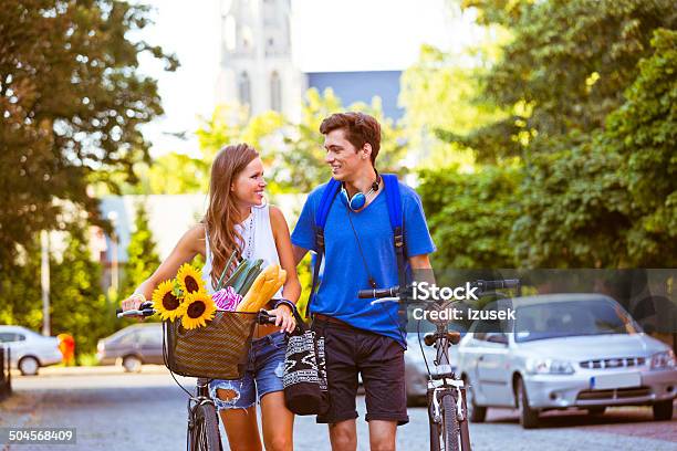 Cheerful Urban Young Couple Stock Photo - Download Image Now - 20-24 Years, Active Lifestyle, Adolescence