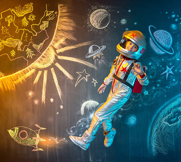 istock Little girl astronaut 504569113
