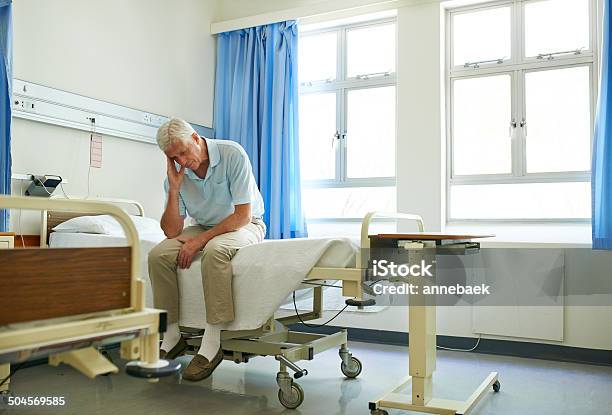 Waiting Is More Painful Than The Headache Stock Photo - Download Image Now - Sitting, Bed - Furniture, Hospital