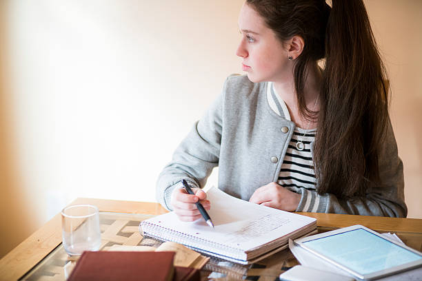 istock Teenager girl make a homework 504574086