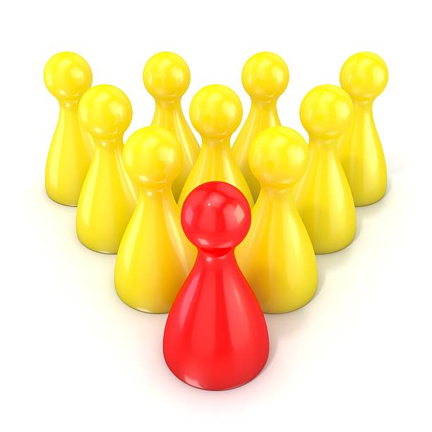 istock Leadership concept. Red game piece in front of yellows 504576448