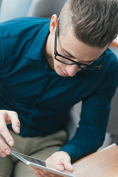 istock Handsome businessman using social networks for promotion and crowd funding 504579180