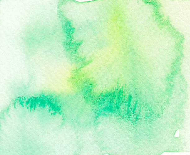 istock wet watercolor background in yellow green tones 504579900