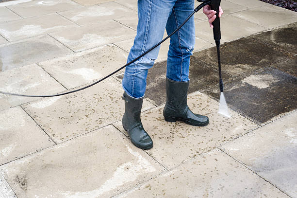 istock Pressure-washing the patio 504579965