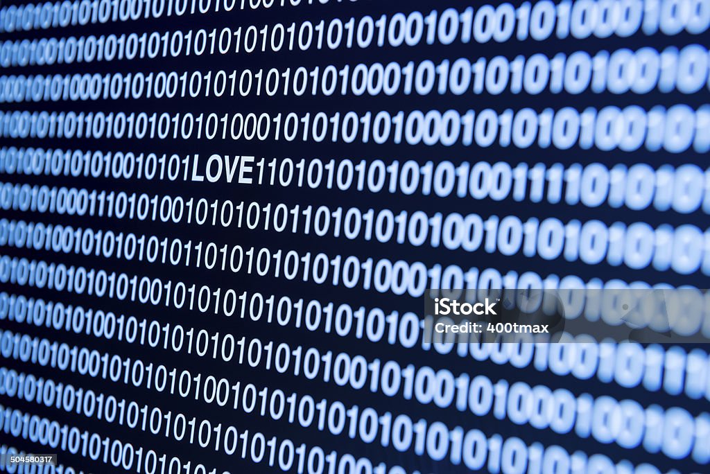 Online Love Concept Love on a blue tinted computer monitor with lines of code surrounding it. Blue Stock Photo