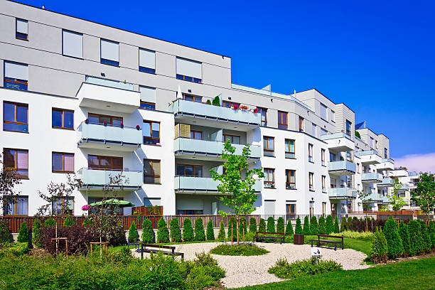 istock Modern complex of white apartment buildings 504580413