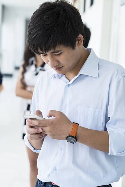 istock Asian man and his colleagues 504580947