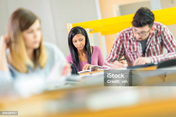 Students Studying In A Library Stock Photo - Download Image Now - 16-17 Years, 20-24 Years, 20-29 Years