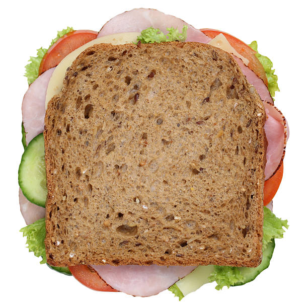 istock Sandwich toast bread for breakfast with ham top view isolated 504583032