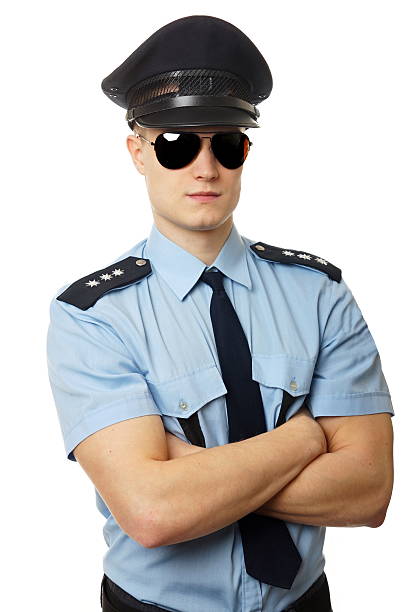 istock Portrait of smiling policeman 504583198