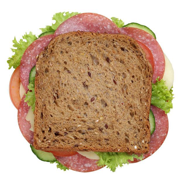 istock Sandwich toast bread for breakfast with salami top view isolated 504584596