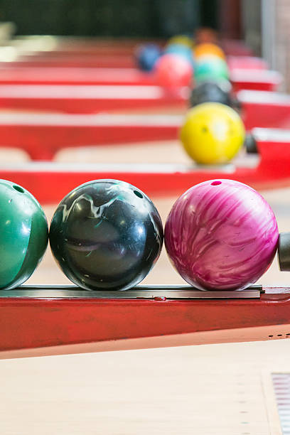istock colorful bowling balls on rack selective focus 504585313
