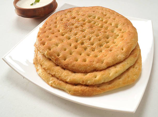 Delicious Kulcha A traditional Pakistani and Indian bread taftan stock pictures, royalty-free photos & images