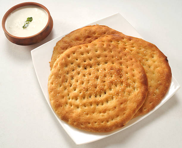 Kulcha Top View A traditional Pakistani and Indian bread taftan stock pictures, royalty-free photos & images