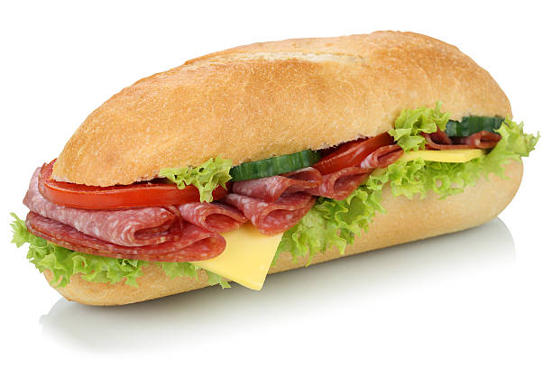 istock Sub deli sandwich baguette with salami isolated 504585820