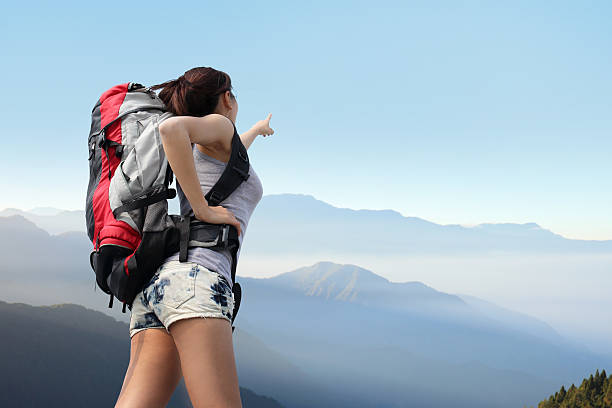 istock happy woman mountain hiker 504586241