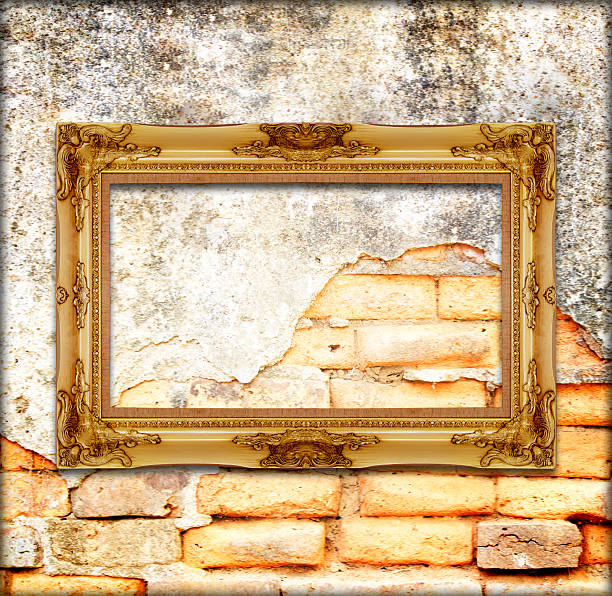 istock gold picture frame antique vintage  on the brick wall background 504586569