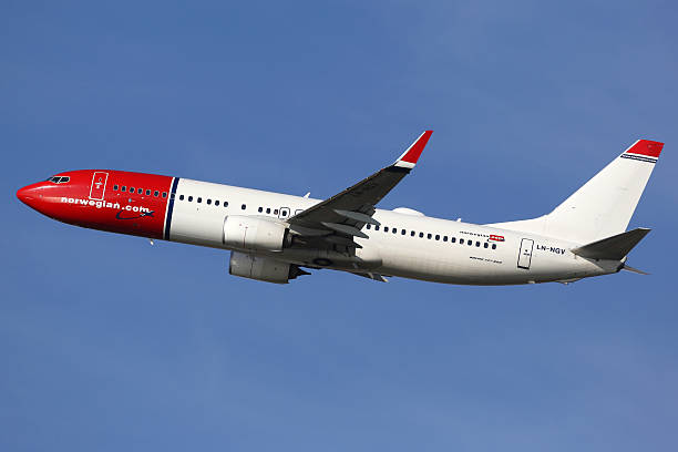 Barcelona, Spain - December 12, 2014: A Norwegian Air Shuttle Boeing 737-800 with the registration LN-NGV taking off from Barcelona Airport (BCN) in Spain. Norwegian is the third largest low-cost carrier in Europe.