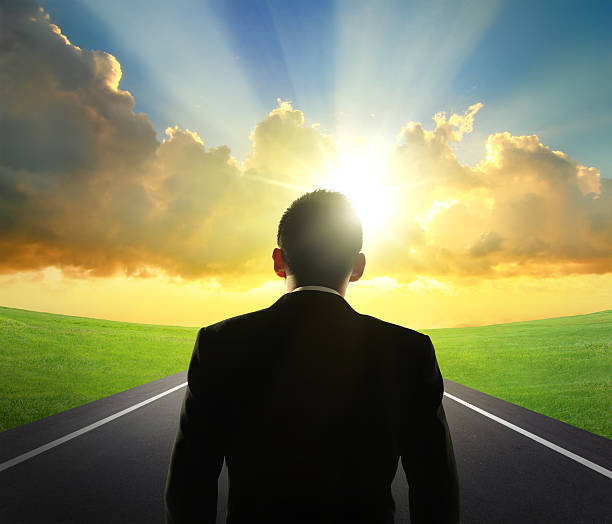 istock business man look sunrise 504586967
