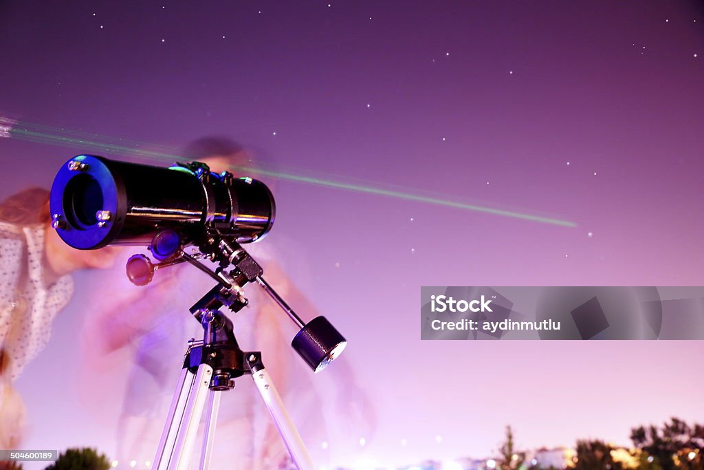 Viewing Stars through telescope Viewing Stars through telescope. Night Stock Photo